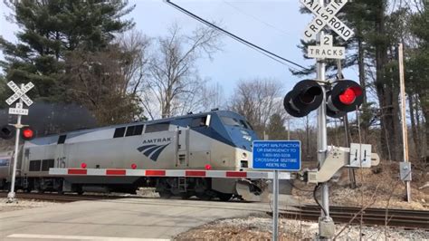 Vermonter Amtrak Crosses Railway Crossing With A Advanced Warrning