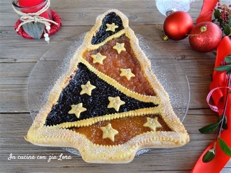 Fatela raffreddata e cospargetela con zucchero a velo. Ricetta crostata albero di natale un dolce semplice ...