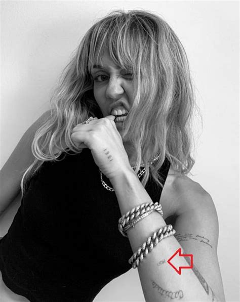 Miley Cyrus Tattoos Their Meanings Body Art Guru