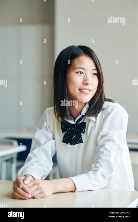 High School Girls Smiling In A Classroom Stock Photo Alamy
