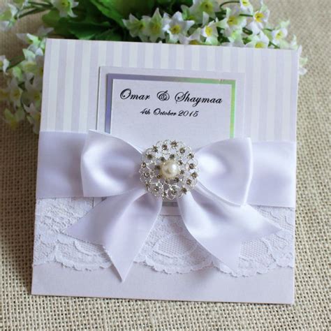 Envelope with flower and ribbon. Elegant Lace Wedding Invitation With Ribbon Bow And ...