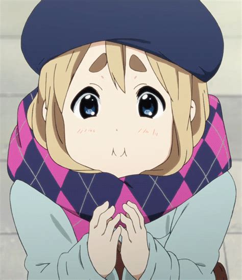 an anime character with blue eyes and a hat