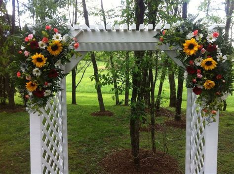 Country Wedding Decorated Arch By Shades Of Pink Wedding Flowers
