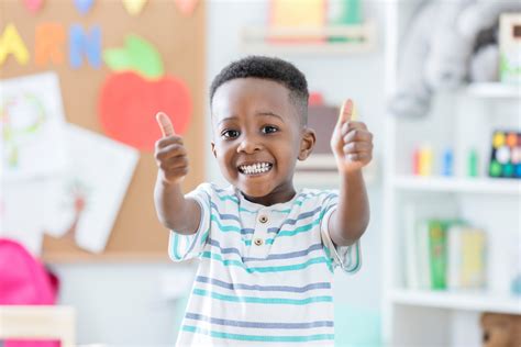 Early Years Blog Adorable Boy Gives Thumbs Up In Preschool