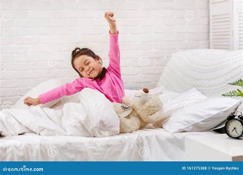 Little Child Girl Wakes Up From Sleep Stock Photo Image Of Female