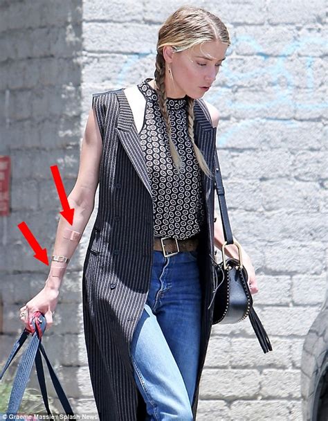 Amber Heard Official Fansite Style Fashion Photos Makeup Lifestyle News Mysterious Marks