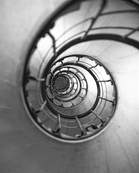 Grayscale Photo Of Spiral Staircase · Free Stock Photo