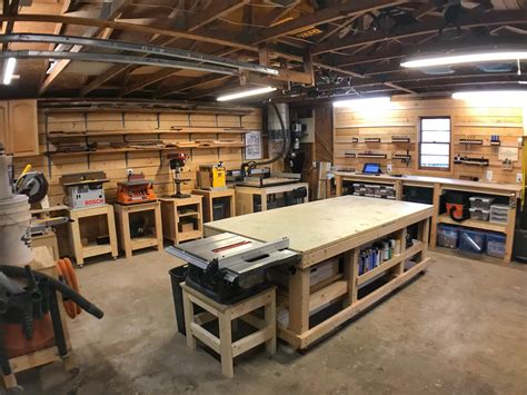 a garage filled with lots of workbenches and tools