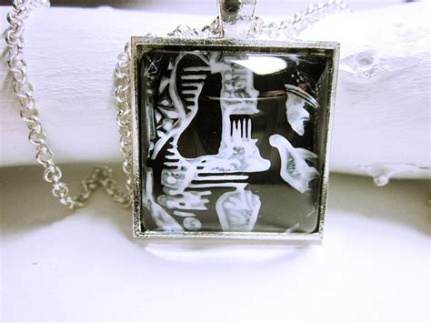 Here are some really fun gift ideas for music lovers! Guitar Pendant Black White Music Lovers Guitar Pendant ...