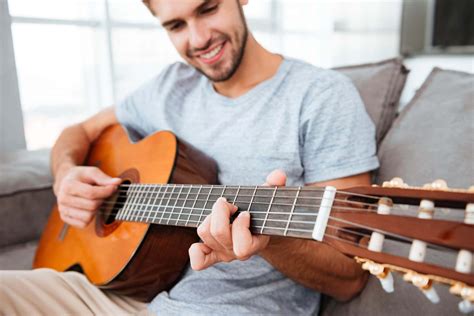 Cómo Sujetar Correctamente Una Guitarra Entretenimiento Digital