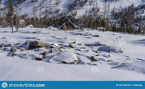Picturesque Boulders In The Valley Are Covered With A Layer Of Snow
