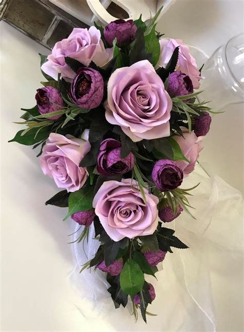 silk wedding bouquet lilac lavender roses purple ranunculus teardrop flowers wedding bouquets