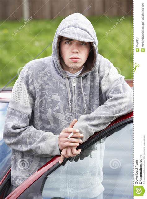 1,048 likes · 313 talking about this. Young Man Standing Next To Car Stock Image - Image: 10401231