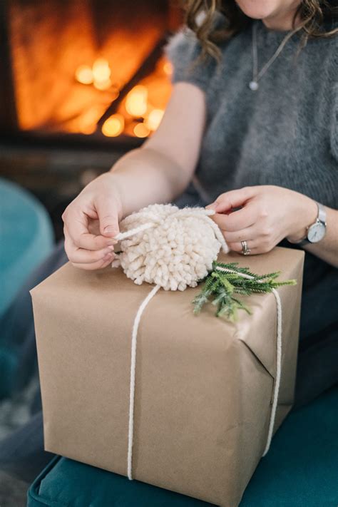 Glitter would work too, although your friend or loved one might not forgive. Brown Paper & Pom Pom Gift Wrapping Ideas | The DIY Mommy