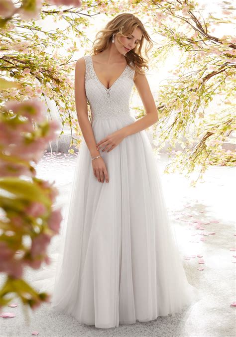This outfit embodies a typical bride's quirky grace. Lola Wedding Dress | Style 6891 | Morilee
