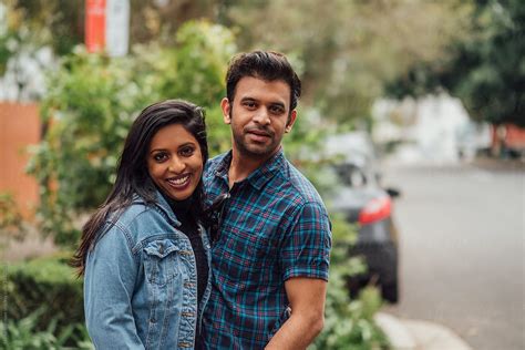 Indian Couple Stand Together By Stocksy Contributor Jayme Burrows
