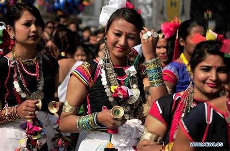 Nepalese Tharu Women Dressed In Traditional Clothes Join In Celebration