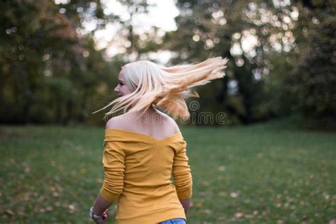 Young Blonde Woman Turning Around Stock Image Image Of Alone Casual
