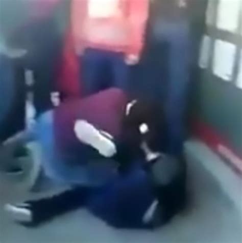 Two Schoolgirls Caught Having Brutal Brawl As Classmates Cheer Them On
