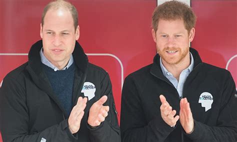 Princes William And Harry Cheer On A Struggling Runner At The London