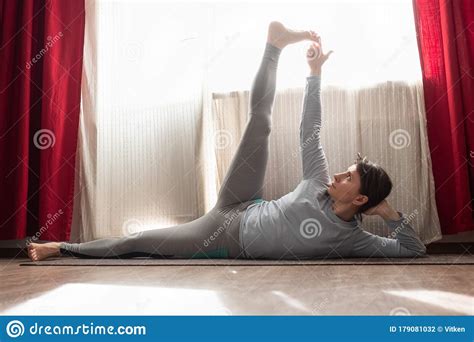 Young Woman Doing Fitness Workout Exercise Stretching Legs Anantasana