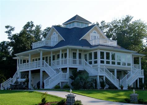 Southern living ranch house plans one story craftsman house plan a simplified roofline creates interest with thoughtfully placed gable accents. Cottage House Plans with Wrap around Porch Beach Cottage ...