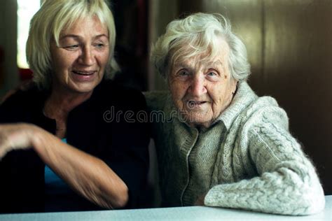Portrait Of A Mature Woman Fooling Around With Her Old Mother Love