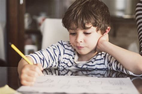 4 Years Old Doing Homework At Home Stock Photo Image Of Caucasian
