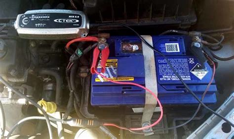 Remove the negative cable of the charger from the vehicle and then the positive cable. How to DeSulfate a car battery with a charger and bring it ...