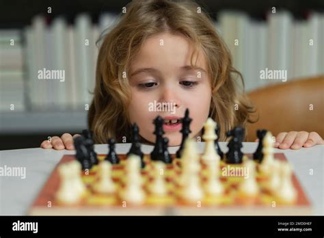 Little Child Play Chess Kid Playing Board Game Thinking Child
