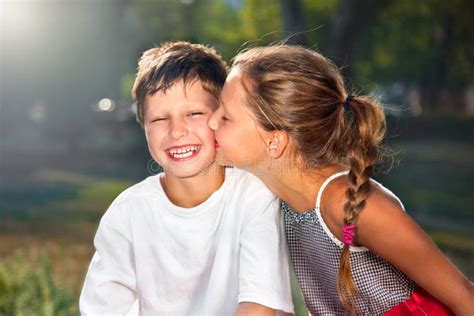 Girl Kissing Boy Stock Image Image Of Happy Smiling 26847881