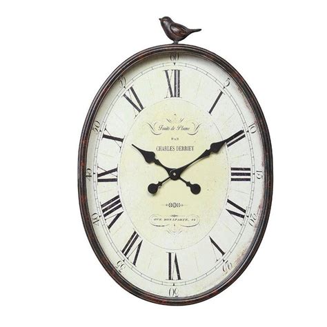 3r Studios Traits De Plume 2225 In H X 17 In W Oval Wall Clock With