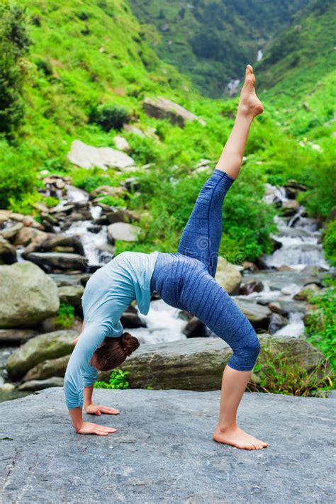 Woman Doing Yoga Asana At Waterfall Stock Photo Image Of Ashtanga