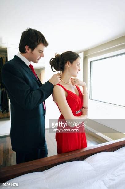 Wife Getting Dressed Stock Fotos Und Bilder Getty Images