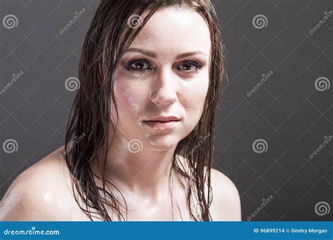 Closeup Portrait Of Caucasian Sensual Brunette Showing Wet And Shining