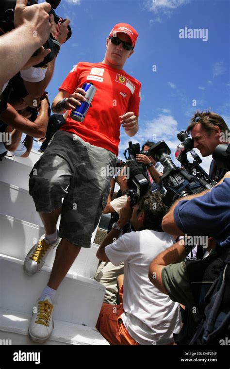 Finnish Formula One Driver Kimi Raikkonen Of Ferrari Walks To The