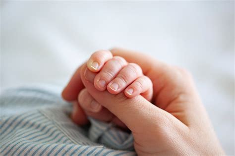 Baby Boy Holding Mothers Hand Stock Photo Download Image Now Istock