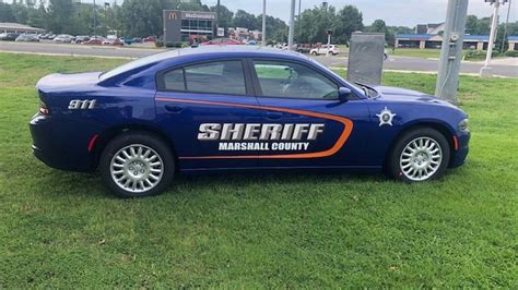 Marshall Co Officials Debut New Blue Orange Police Vehicles