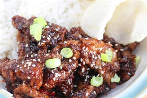 In a large bowl, whi. Crispy Mongolian Beef - delicious sticky tender beef strips in