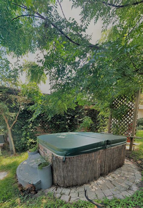 My Old Modest Hot Tub Shrouded In Jasmine White Cedar And Wisteria