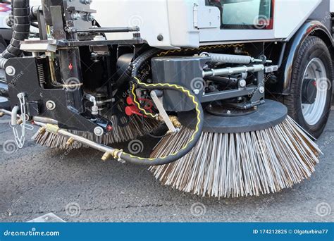 Big Round Brushes Of Street Sweeper With Wide Sweeping Path Close Up