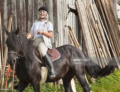 Germany Bavaria Mature Woman Riding Horse Photo Getty Images