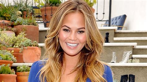 Chrissy Teigen Shows Off Her Booty In Nothing But A Thong Bikini