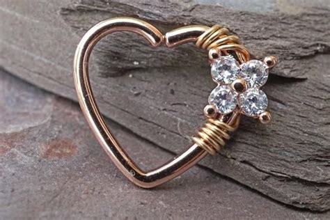 This collection features the best jewelry for daith piercings! 16 Gauge Rose Gold CZ Heart Daith Rook Heart Hoop Ring Daith in 2020 | Rook hoop, Tragus hoop ...