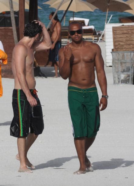 Shirtless Donald Faison Hanging Out On The Beach MenofTV