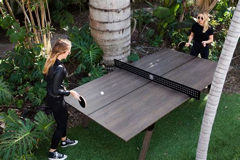 The frame is made from 3 drop ceiling main beams sunk into pressure treated 4 x 4, suppo. Woolsey Outdoor Ping Pong Table | Outdoor ping pong table
