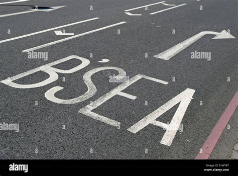 British Road Marking With Abbreviation For Battersea And Right Pointing
