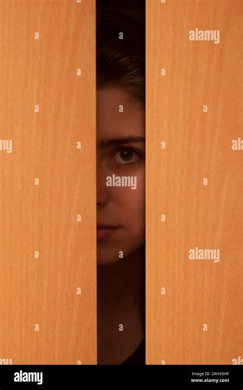 Girl Peeking Door Hi Res Stock Photography And Images Alamy