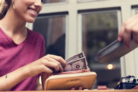 Woman Paying Cash For Bill Premium Photo Rawpixel