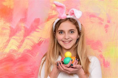 Happy Easter Girl In Bunny Ears With Colorful Painted Eggs Stock Image